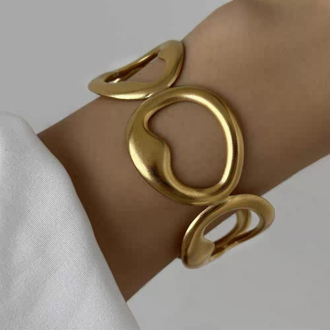 Aurora Loop Statement Cuff by Suryatra