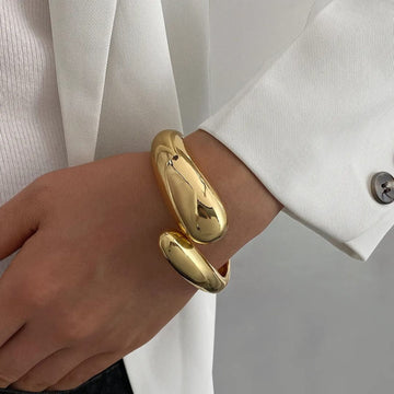 Luxe Sculpted Gold Cuff Bracelet by Suryatra
