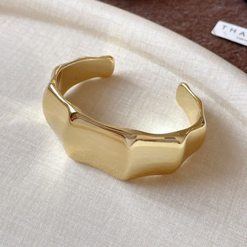 Golden Facet Statement Cuff by Suryatra
