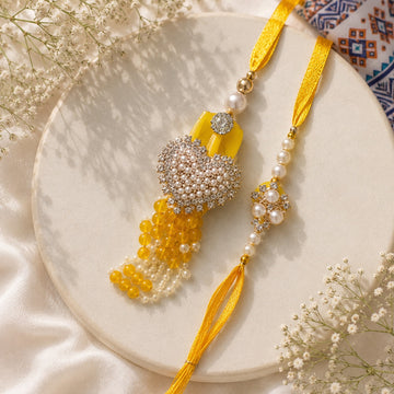 Sunshine Pearl Rakhi & Bracelet Set  by Suryatra