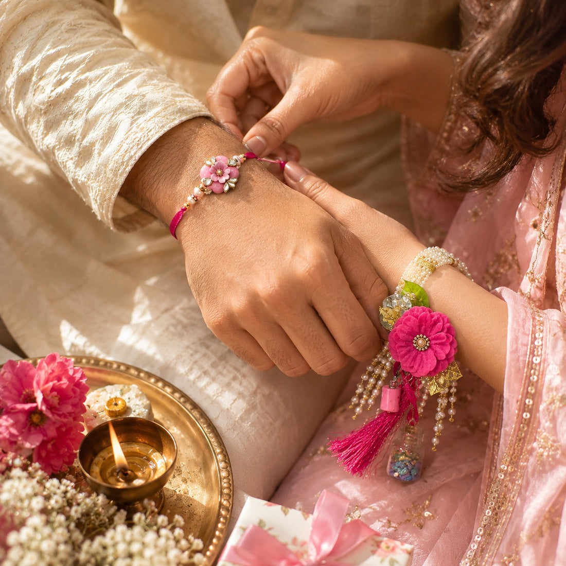 Blush Bloom Pearl Rakhi Set by Suryatra