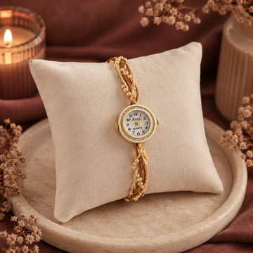 Champagne Pearl Rakhi Watch by Suryatra