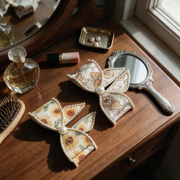 Sunflower & Butterfly Cream Hair Bows by Suryatra