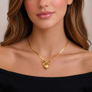 Golden Heart Bow Pendant Necklace By Suryatra