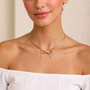 Golden Ribbon Bow Necklace By Suryatra
