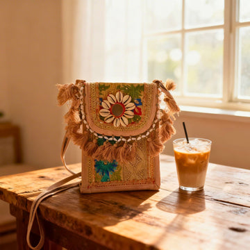 Pastel Boho Embroidered Tassel Sling Bag by Suryatra