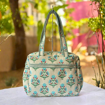Handcrafted Floral Quilted Bag by Suryatra