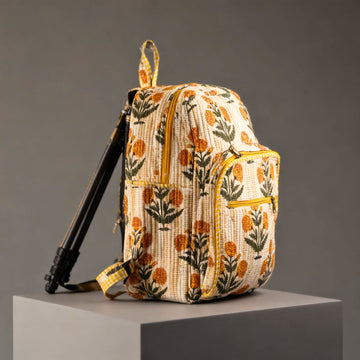 Yellow Floral Quilted Backpack by Suryatra