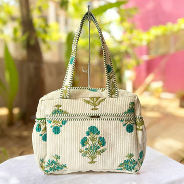 Green Floral Quilted Handbag by Suryatra