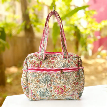 Pink Floral Quilted Handbag by Suryatra