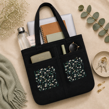 White Daisy Meadow Noir Canvas Tote Bag by Suryatra